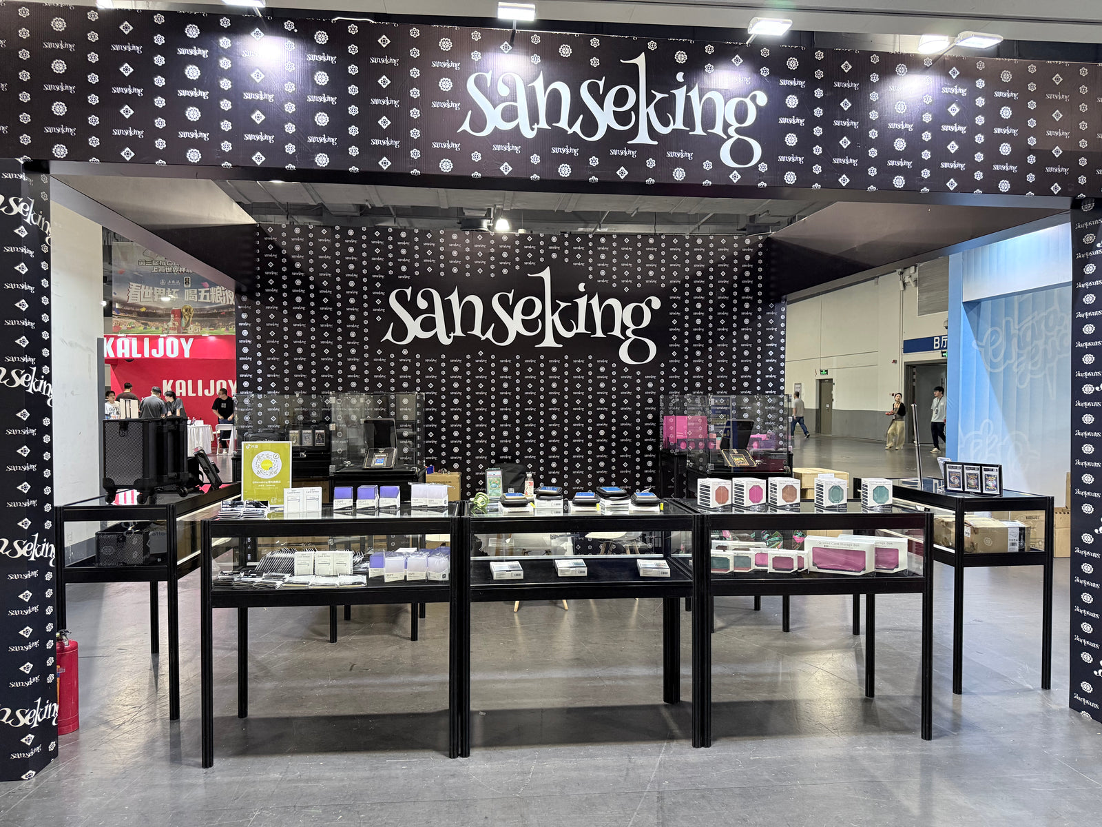 Sanseking exhibition stand displaying trading card accessories