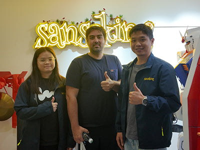 Sanseking team with a business partner
