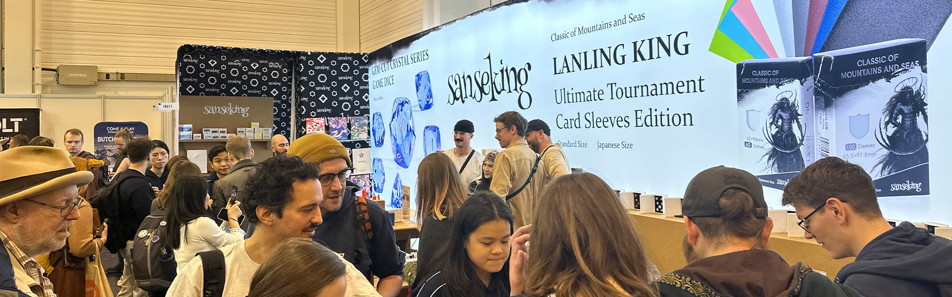 Visitors at the Sanseking SPIEL Essen exhibition booth